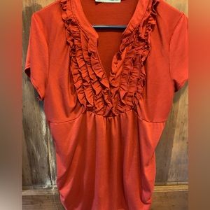 Maurices XL dressy top, has ruffles on front.